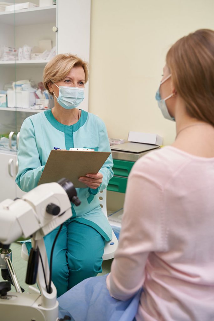 doctor talking to her patient
