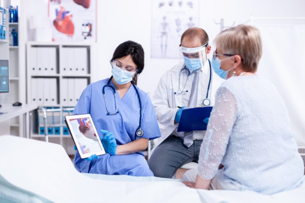 Doctors telling the old woman